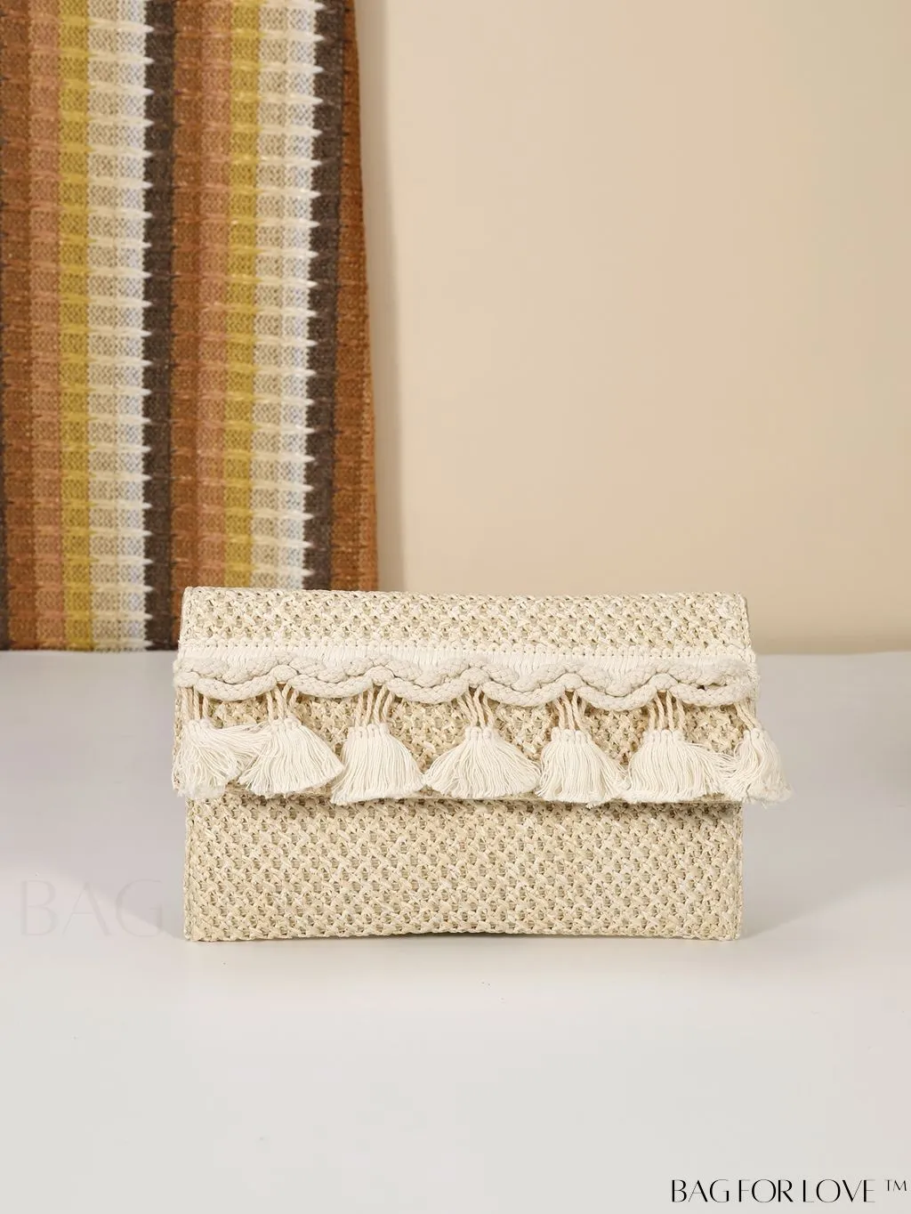BagForLove - Elegant Flap Woven Clutch Bag with Tassel and Furry Ball Decoration