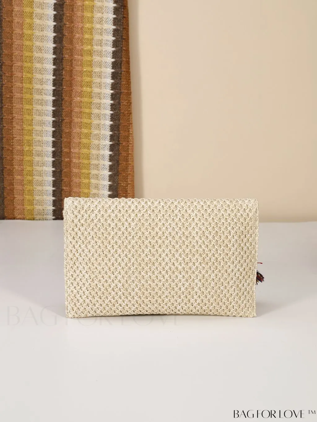BagForLove - Elegant Flap Woven Clutch Bag with Tassel and Furry Ball Decoration