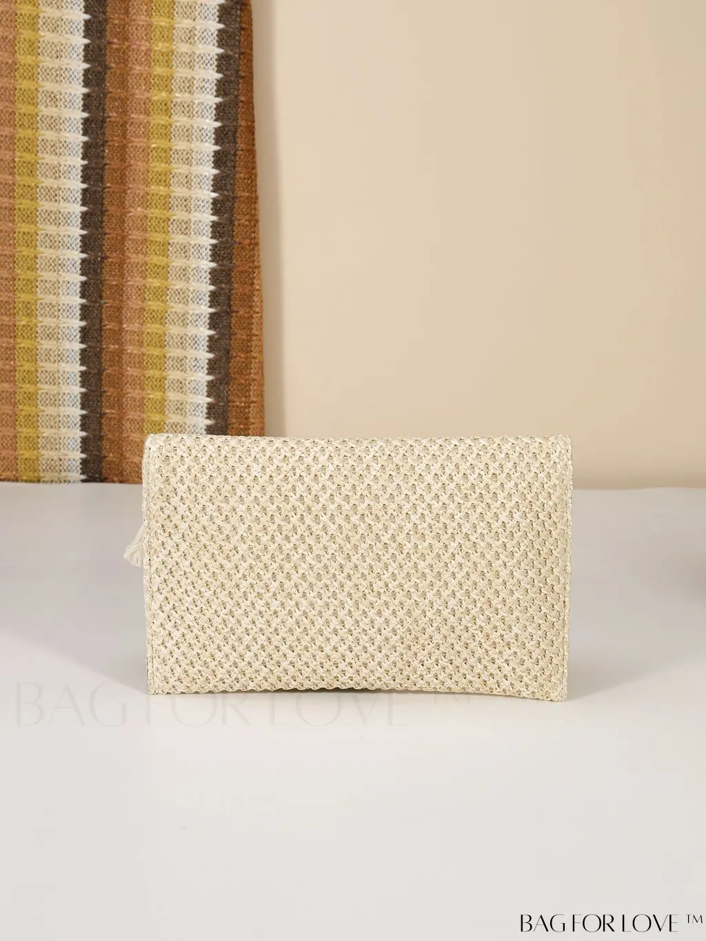 BagForLove - Elegant Flap Woven Clutch Bag with Tassel and Furry Ball Decoration