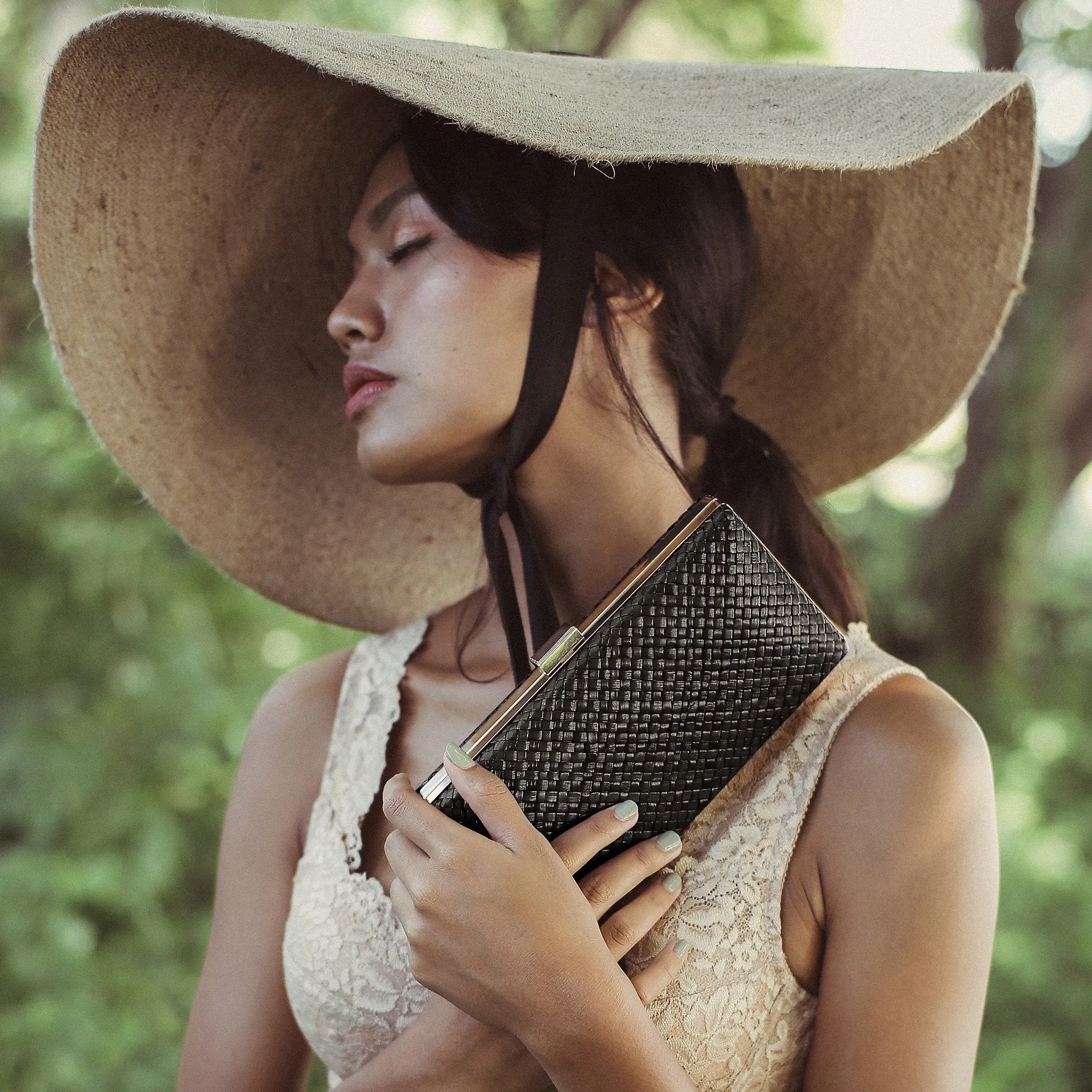 Gitta Jett Black Handwoven Straw Clutch
