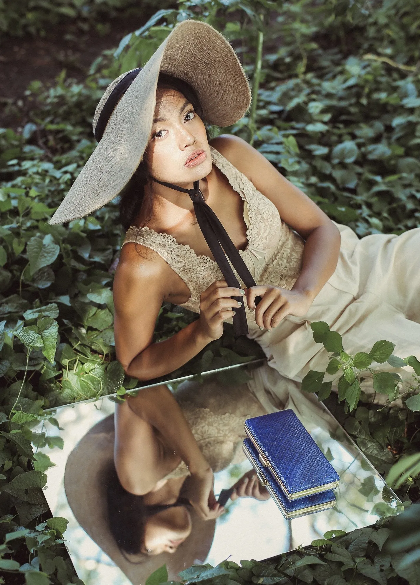 Gitta Royale Handwoven Straw Clutch