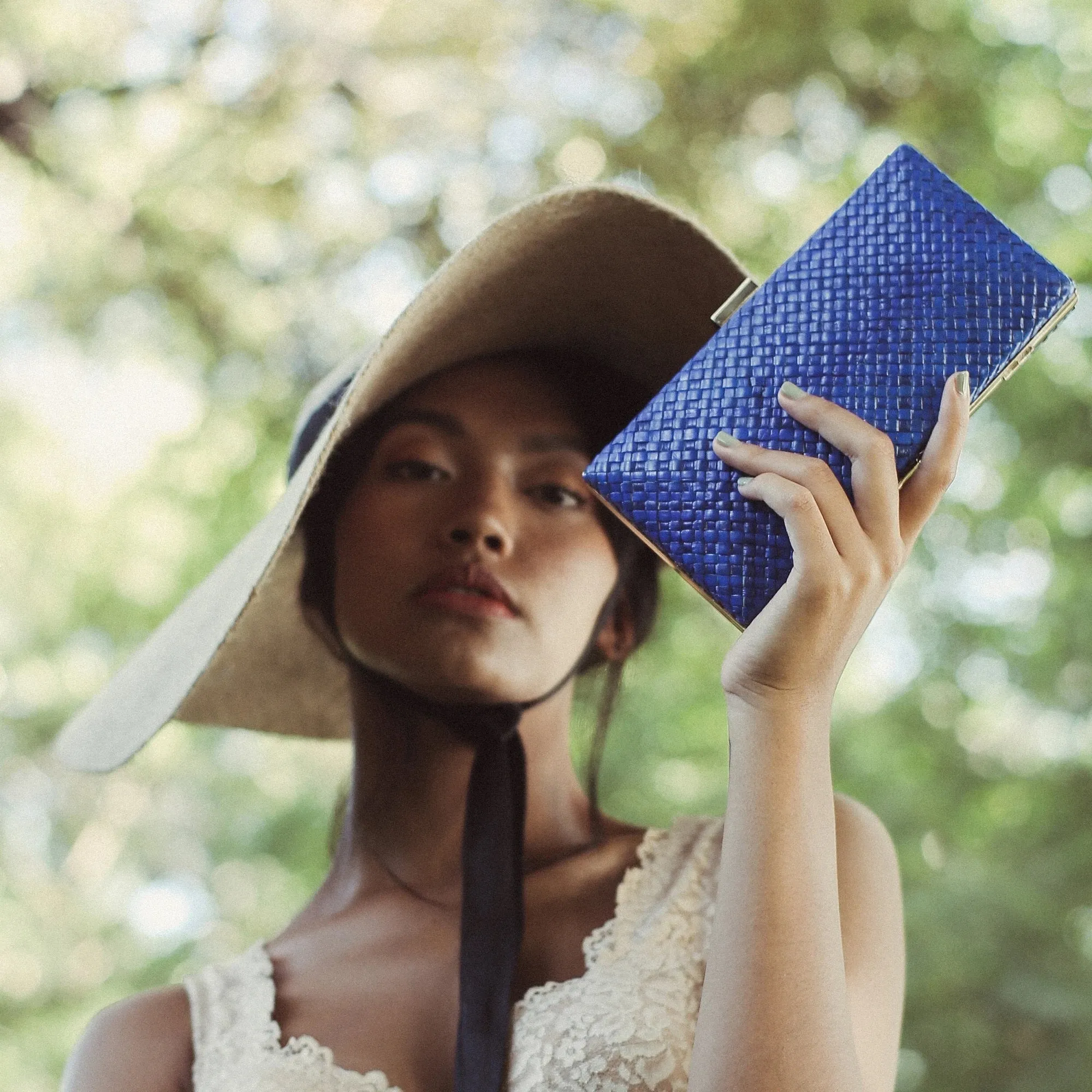 Gitta Royale Handwoven Straw Clutch