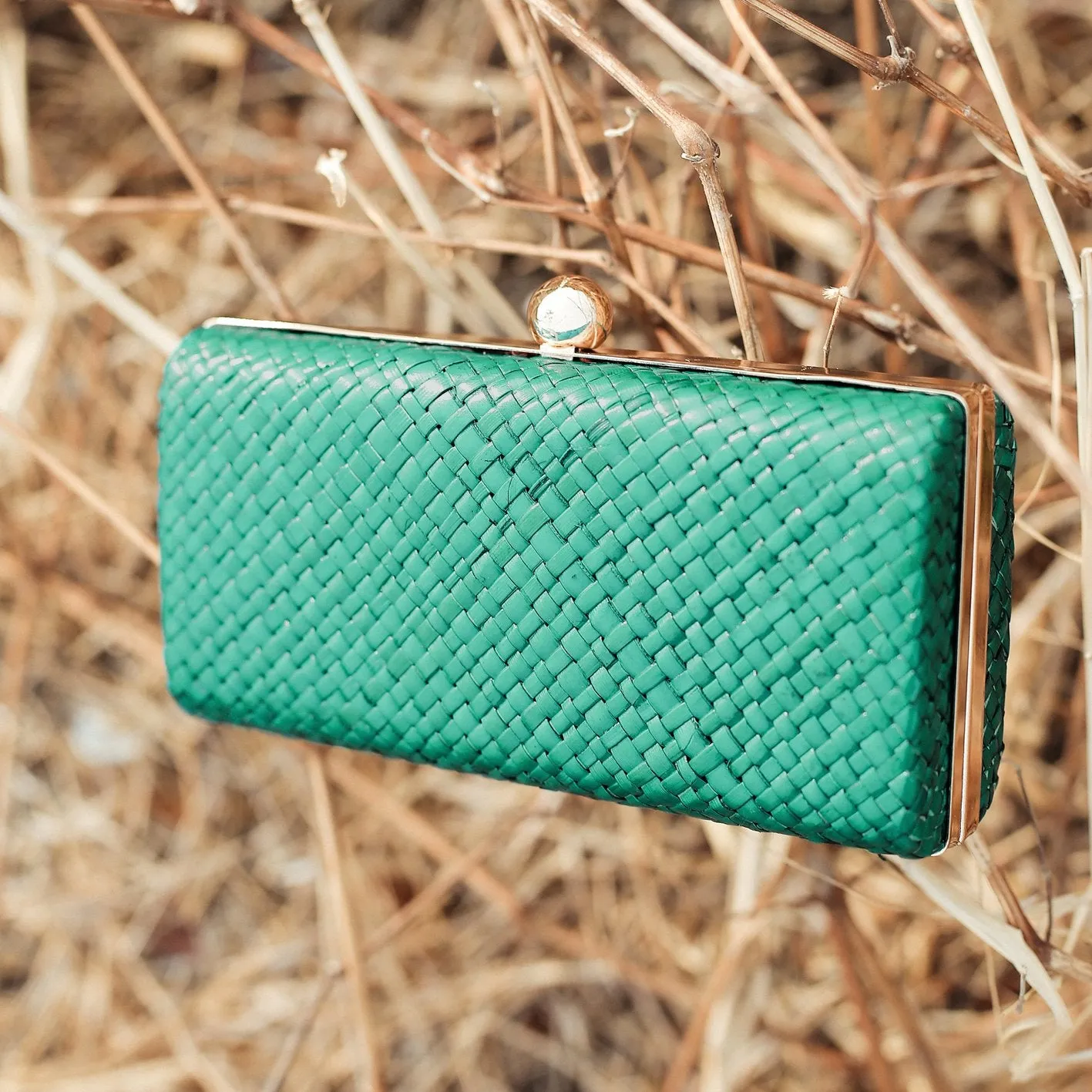 Kotta Emerald Handwoven Straw Clutch