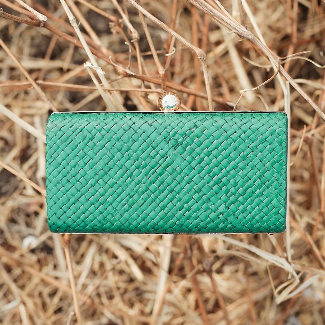 Kotta Emerald Handwoven Straw Clutch